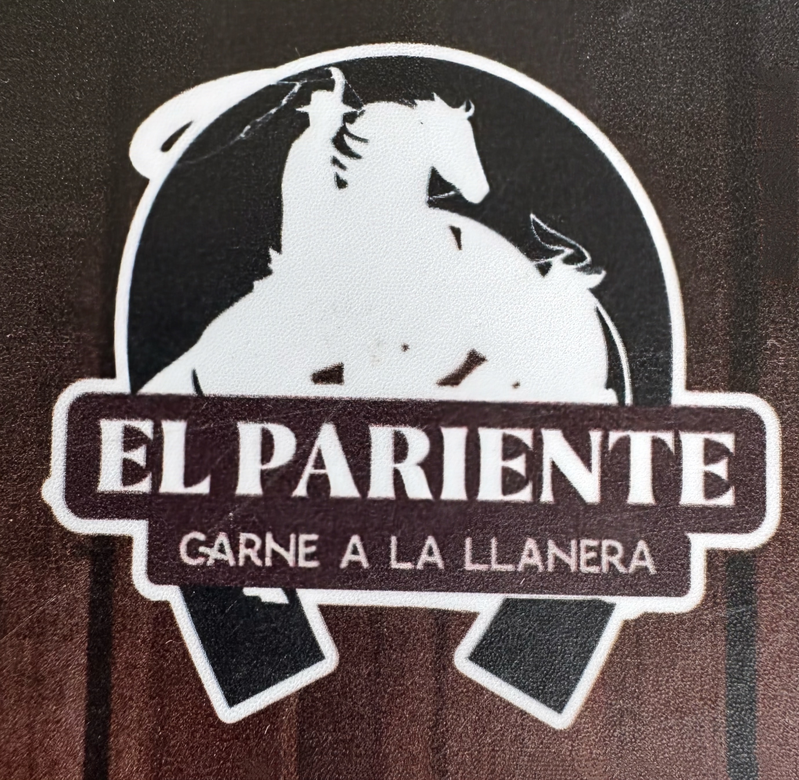 Logo de El Pariente